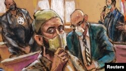 Former Taliban commander Haji Najibullah, previously accused of kidnapping an American journalist, appears on charges related to murdering three U.S. troops in Afghanistan in 2008 during a court hearing in New York, October 15, 2021 in this courtroom sketch.