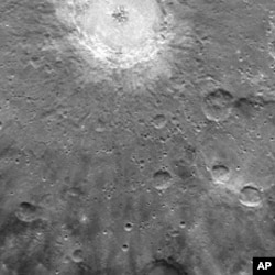 Bright rays, consisting of impact ejecta and secondary craters, spread across this NAC image and radiate from Debussy crater, located at the top. Debussy crater was named in March 2010, in honor of the French composer Claude Debussy (1862-1918). (Photo t