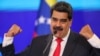 El presidente en disputa de Venezuela, Nicolás Maduro, habla con los medios acreditados en Caracas sobre las recientes elecciones legislativas, celebradas el 6 de diciembre de 2020.