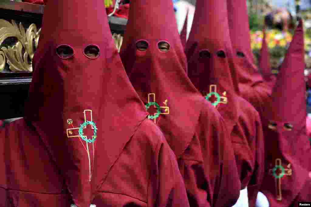 Penitents take part in a processsion on Good Friday in Zipaquira, Colombia. Holy Week is celebrated in many Christian traditions during the week before Easter.