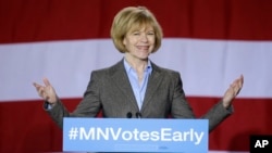 FILE - Minnesota candidate for Lt. Gov. Tina Smith appears at a get-out-the-vote rally in support for Democrats in Minneapolis, Oct. 21, 2014.