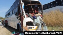 Three people died when a passenger bus and a truck crashed into each other on the Aswa bridge on the Juba to Nimule road in South Sudan on Thursday, Dec. 11, 2014. Hundreds of people have died in accidents on the road since it opened in 2009.