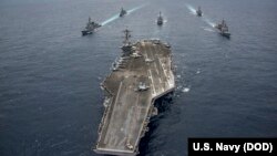 រូប​​ឯកសារ៖ នាវា​ផ្ទុក​យន្តហោះ​​ឈ្មោះ USS Carl Vinson ដឹក​នាំ​ការ​ធ្វើ​សមយុទ្ធ​ជាមួយ​ប្រទេស​ជប៉ុនកាល​ពី​ខែ​មេសា។
