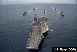 The Nimitz-class aircraft carrier USS Carl Vinson transits the Philippine Sea, April 28, 2017.