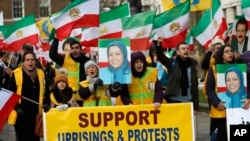 Supporters of Iran's democratic opposition hold a rally in London, Jan. 4, 2018.