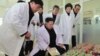 FILE - North Korean leader Kim Jong Un (C) provides field guidance at Kumkop General Foodstuff Factory for Sportspersons in this undated photo released by North Korea's Korean Central News Agency (KCNA) in Pyongyang, Jan. 8, 2015. 