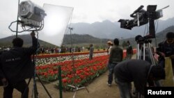 A Bollywood film unit prepares to shoot a scene of Hindi movie "Sadiyan" (Centuries) inside Kashmir's tulip garden in Srinagar, Kashmir, April 9, 2008.