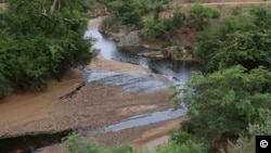 Officials say 33,000 liters of industrial oil spilled into this river late on July 12, 2012 potentially impacting the drinking water for millions of people in Zamfara and Sokoto states in Nigeria. (Photo courtesy Ivan Gayton)