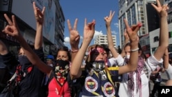Turkish youths shout anti-government slogans as they march in Ankara, Turkey, June 4, 2013.