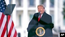 FILE - President Donald Trump speaks during a rally protesting the electoral college certification of Joe Biden as president in Washington, Jan. 6, 2021. 