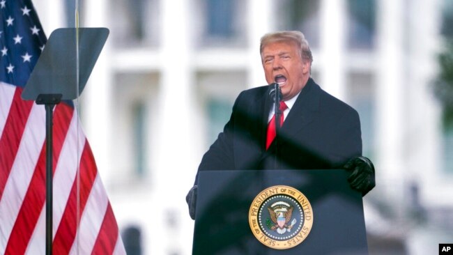 FILE - President Donald Trump speaks during a rally protesting the electoral college certification of Joe Biden as president in Washington, Jan. 6, 2021.