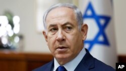 Israel's Prime Minister Benjamin Netanyahu chairs the weekly cabinet meeting in Jerusalem, Nov. 19, 2017. 