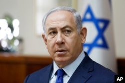 Israel's Prime Minister Benjamin Netanyahu chairs the weekly cabinet meeting in Jerusalem, Nov. 19, 2017.