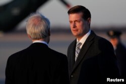 FILE - Then-White House Staff Secretary Rob Porter arrives with U.S. President Donald Trump and first lady Melania Trump aboard Air Force One at Joint Base Andrews, Maryland, U.S. Feb. 5, 2018.