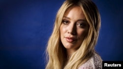 Actress and singer Hilary Duff poses for a portrait while promoting her new album "Breathe In. Breathe Out." in New York, June 17, 2015. 
