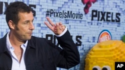 Adam Sandler attends the world premiere of "Pixels" at Regal E-Walk on Saturday, July 18, 2015, in New York. (Photo by Charles Sykes/Invision/AP)