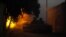 A Free Syrian Army tank fires a shell towards forces loyal to President Bashar Al-Assad in Aleppo, Nov. 30, 2013.