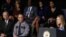 U.S. Vice President Joe Biden, bottom left, Baton Rouge Police Chief Carl Dabadie Jr., center, and U.S. Attorney General Loretta Lynch, top right, listen to Tonja Garafola, widow of East Baton Rouge Sheriff's Deputy Brad Garafola, during a memorial service for three slain Baton Rouge-area police officers at Healing Place Church in Baton Rouge, Louisiana, July 28, 2016.