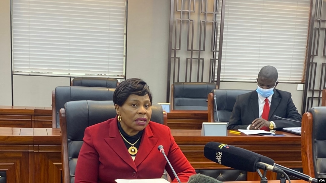 FILE - Monica Mutsvangwa, Zimbabwe’s information minister, talks to reporters in Harare, July 06, 2021. Mutsvangwa says a recent spike in COVID-19 cases has forced authorities to ask all government workers to be vaccinated. (Columbus Mavhunga/VOA)