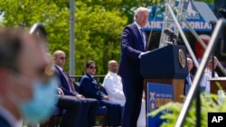 Джо Байден выступает на выпускной церемонии в Академии береговой охраны США в Нью-Лондоне, штат Коннектикут, среда, 19 мая 2021 г. 