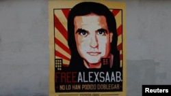 Cartaz a pedir a libertação de Alex Saab, em Caracas