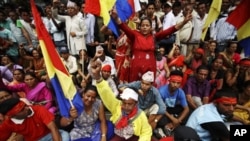 Activists in support of the National Democratic Party chant slogans during a protest near the constitution assembly building in Kathmandu, May 27, 2011