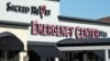 FILE - Signage for the Sacred Heart Emergency Center is seen in Houston, Texas, March 29, 2024.