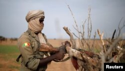 FILE - A Malian Armed Forces (FAMA) soldier is pictured in Ndaki, Mali, July 29, 2019. 