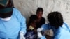 FILE - A South Sudanese girl suffering from cholera is being treated by medics in Juba Teaching Hospital in Juba, May 27, 2014. More than 1.1 million doses of oral cholera vaccine arrived in Juba, and will be dispatched next week to hot spots areas like the town of Bentiu.