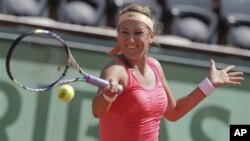 Victoria Azarenka dari Belarus maju ke babak tiga Kejuaraan Perancis Terbuka tanpa hambatan (30/5).