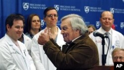 Del Peterson, grandfather of face transplant recipient Dallas Wiens, turns and gives thumbs up to the surgical team during a news conference at Brigham and Women's Hospital in Boston, March 21, 2011