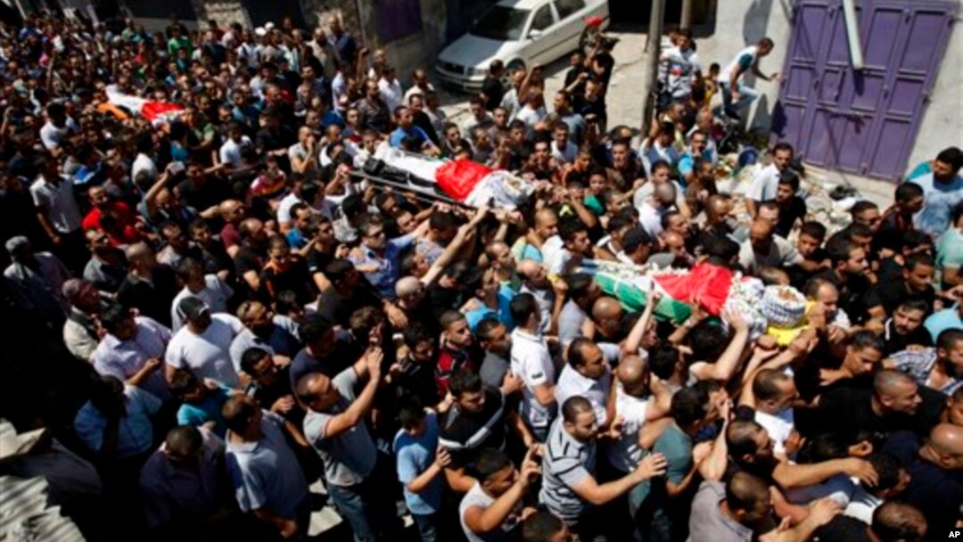 Tang lễ của những người Palestine bị thiệt mạng trong vụ đụng độ tại trại tị nạn Qalandia, 26/8/13