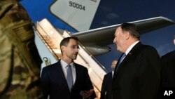 Secretary of State Mike Pompeo, center, talks with Charge D'affaires at the U.S. Embassy in Baghdad Joey Hood, May 7, 2019. (Mandel Ngan/Pool Photo via AP) 