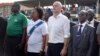 FIFA's new president, Gianni Infantino, at center-right, stands with South Sudan's Vice President James Wani Igga, right, before a match between South Sudan and Benin, in Juba, March 23, 2016. Infantino came to help open the South Sudan Football Association at a time when the young country's government is struggling for funds due to a drop in worldwide oil prices and an expensive civil war that is in its third year. 