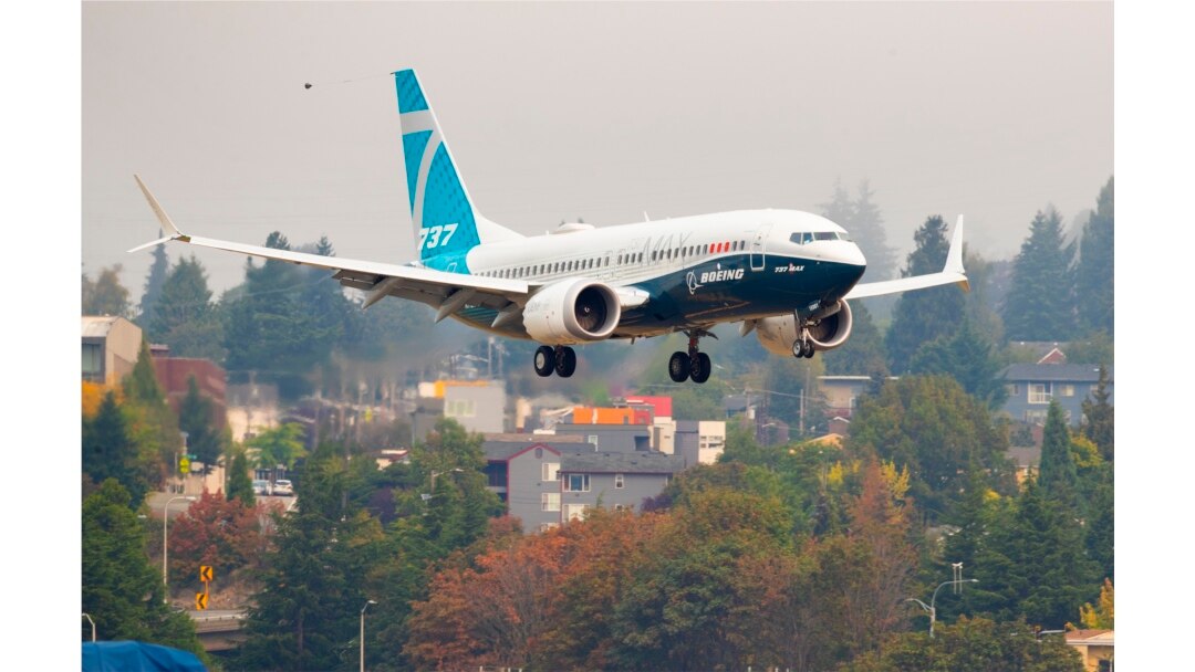 A Boeing 737 Max lands at Boeing Field in Seattle, Sept. 30, 2020.