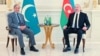 Pakistan's Prime Minister Shehbaz Sharif, left, is seen meeting with Azerbaijan's President Ilham Aliyev in Baku, Azerbaijan, in a photo posted by Sharif Feb. 24, 2025, on his X account (@CMShehbaz).