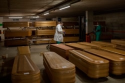 Coffins with the bodies of coronavirus victims are stored waiting for burial or cremation at the Collserola morgue in Barcelona, Spain, April 2, 2020.