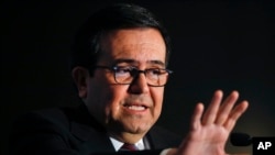 FILE - Ildefonso Guajardo, Mexico's economy minister, speaks at the Economic Club of Detroit, March 3, 2017. 