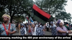 African dancers take part in the American Evolution 2019 Commemoration ceremony, marking the 400-year anniversary of the arrival of the first enslaved Africans, in Hampton, Va., Aug. 24, 2019. 