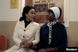 FILE - Coretta Scott King, played by Weruche Opia, and Betty Shabazz, played by Jayme Lawson, interact in this still from the series GENIUS: MLK/X.