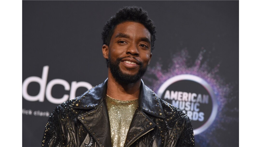 FILE - Chadwick Boseman poses in the press room at the American Music Awards on Nov. 24, 2019, at the Microsoft Theater in Los Angeles.