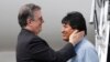 Mexican Foreign Minister Marcelo Ebrard, left, welcomes former Bolivian President Evo Morales upon his arrival to Mexico City. Mexico granted asylum to Morales, who is under mounting pressure from the military and the public after his re-election victory triggered weeks of fraud allegations and deadly protests.