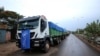 FILE - The World Food Program (WFP) convoy trucks carrying food items for the victims of Tigray war are seen parked after the checkpoints leading to Tigray Region were closed, in Mai Tsebri town, Ethiopia, June 26, 2021.