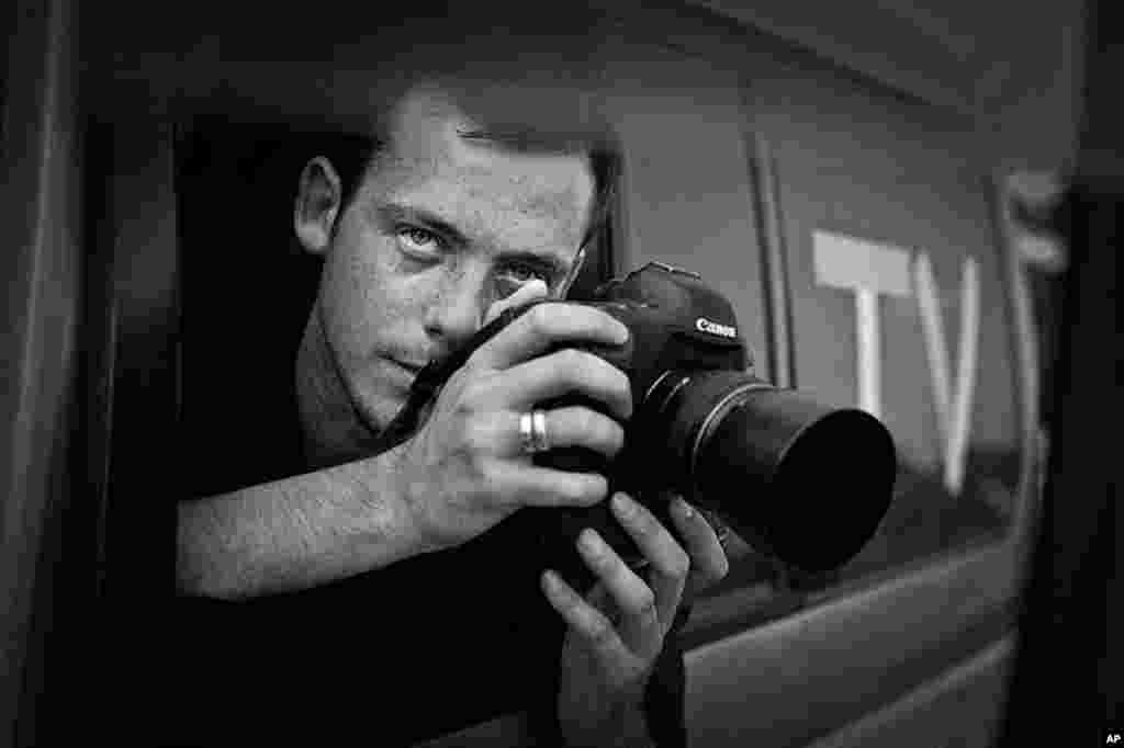 French photographer Remi Ochlik died on February 22, 2012 after Syrian government forces shelled the opposition stronghold of Homs. He was 28. (AP)