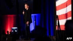 Tesla and SpaceX CEO Elon Musk speaks during a town hall event hosted by America PAC in support of former U.S. President and Republican presidential nominee Donald Trump at the Greater Philadelphia Expo Center in Oaks, Pennsylvania, on Oct. 18, 2024.