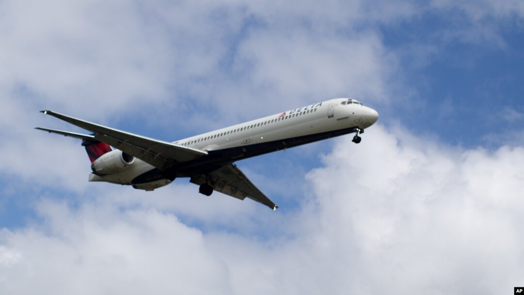 FILE - A Delta Air Lines plane arrives at Hartsfield–Jackson Atlanta International Airport, Aug. 8, 2016. Delta on Feb. 24, 2018, joined the list of U.S. companies indicating they were ending discount programs with the National Rifle Association.