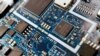 FILE - Semiconductor chips are shown on a circuit board. An updated rule curbing exports of U.S. chipmaking equipment to China is in the final stages of review, a U.S. government agency posting said on Oct. 5, 2023.