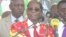 Zimbabwe President Robert Mugabe addressing members of his Zanu PF party at a football stadium in Lupane, about 600km south west of Zimbabwe's capital (S. Mhofu/VOA)