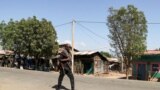 FILE - A member of the Amhara Special Force patrols a street in Soroka village in Amhara region near a border with Tigray, Ethiopia, Nov. 9, 2020. 