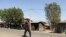 FILE - A member of the Amhara Special Force patrols a street in Soroka village in Amhara region near a border with Tigray, Ethiopia, Nov. 9, 2020. 